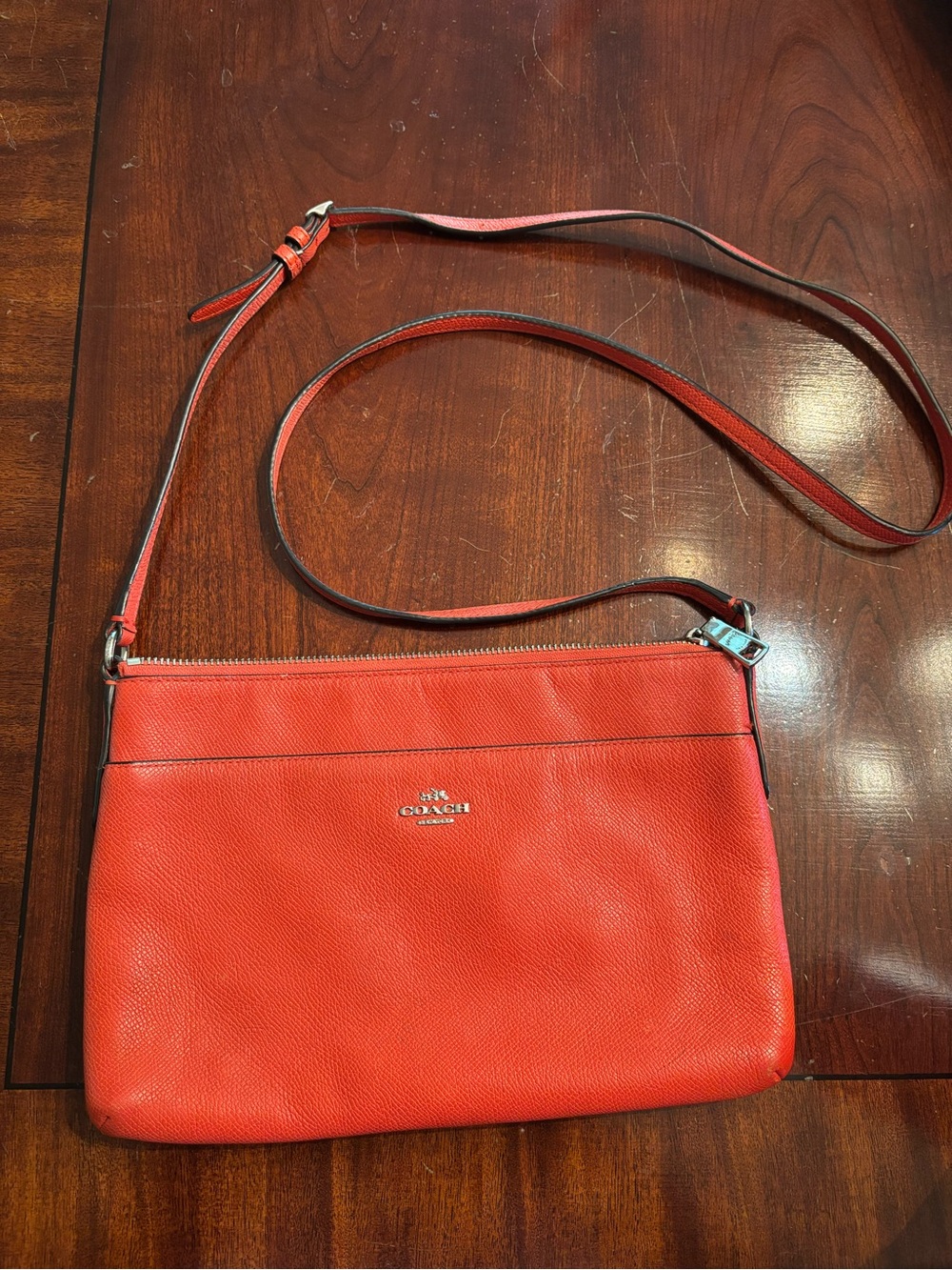 Coach Orange Leather Crossbody Pouch with Adjustable Strap